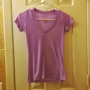 I am selling a small lavender color V-neck